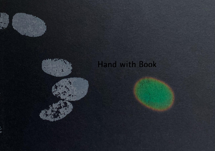 Hand with Book   - Karen Blake